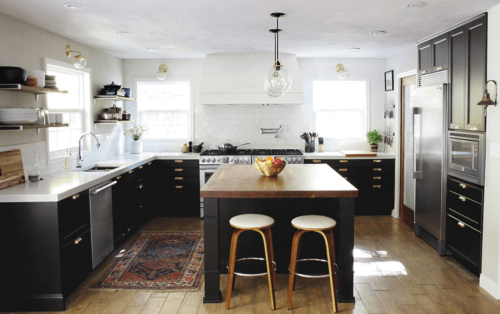 black kitchen with light walls