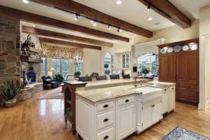 Kitchen in luxury home with stone fireplace