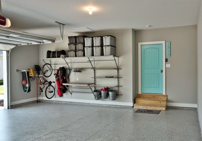 clean garage with stained flooring