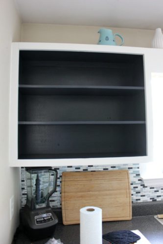 black kitchen shelving open cabinets