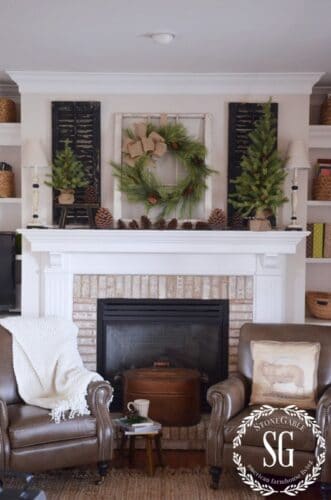 christmas mantel with textures of pines