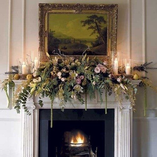 mantel covered in fake flower arrangment in living room