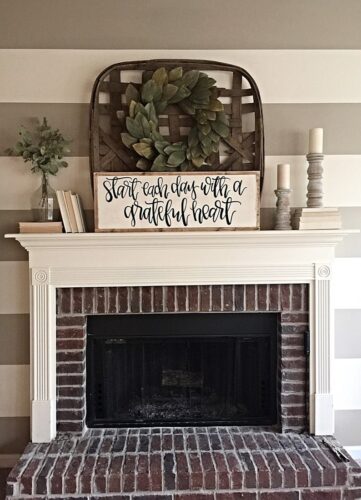 black and white framed word art on mantel