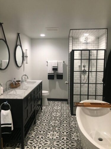 distracting flooring in black and white bathroom