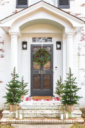 simple wreath on farmhouse white doorway