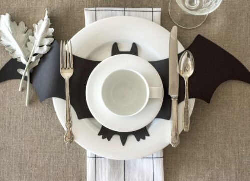 halloween place settings at elegant dinner