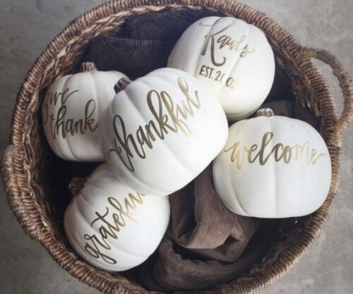 halloween white pumpkins with gold caligraphy lettering